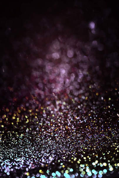 Blurred multicolor black background with glitter. Abstract space background with free space for your text, web design. Design concept, text, postcard, background. Christmas background. - Photo, Image