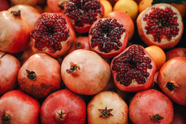 Ripe fresh pomegranates background. - Photo, Image