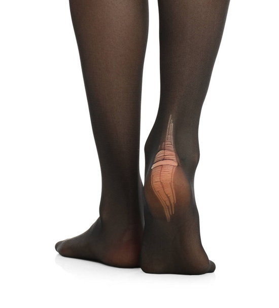 Woman wearing torn tights on white background, closeup - Foto, Imagem
