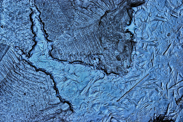 blue ice glass background, abstract texture of the surface of the ice on the glass, frozen seasonal water - Φωτογραφία, εικόνα