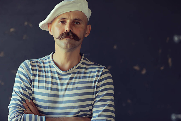 brutal cook with mustache, unusual marine chef in a vest, vintage style - Foto, Imagen