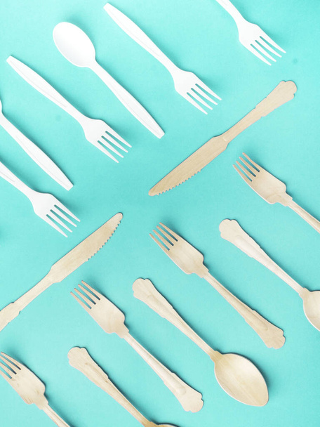Eco friendly harmful plastic cutlery and eco friendly wooden cutlery. plastic free concept - Photo, Image