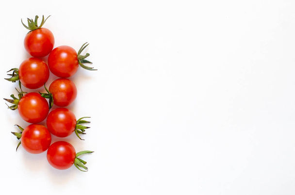 Cherry tomatoes isolated on a white background. Close-up.  - Φωτογραφία, εικόνα