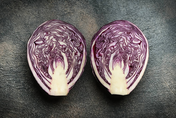 Fresh red cabbage on a black background. Top view. Copy space. - Фото, зображення