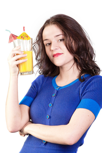 Beauty woman in blue dress with yellow orange juice - Photo, image