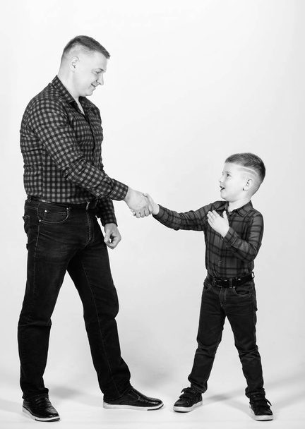 Dad and adorable child. Parenthood concept. Fathers day. Father example of noble human. Cool guys. Father little son red shirts family look outfit. Best friends forever. Happiness being father of boy - Fotoğraf, Görsel