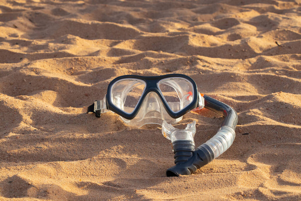 mask for diving lies sand in egypt close up - Foto, Imagen