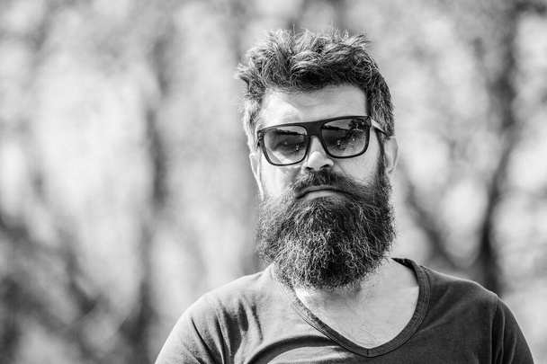 Mature hipster with beard. Bearded man outdoor. Beard care and barbershop. male fashion and beauty. brutal male with perfect style. bearded man with lush hair. Free and happy time. Perfect style - Foto, afbeelding
