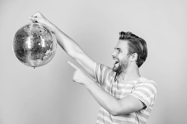 Party fun. man with disco ball. happy party-goer. party time. birthday celebration. christmas or new year holiday. man dancing on disco. having fun. lets celebrate. prom party. event manager - Foto, immagini