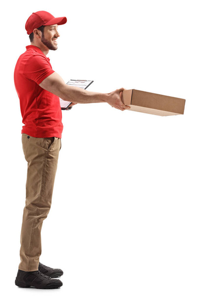 Delivery guy giving a package  - Foto, Imagem