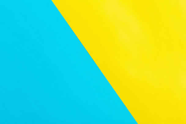 blue and yellow paper background  - 写真・画像