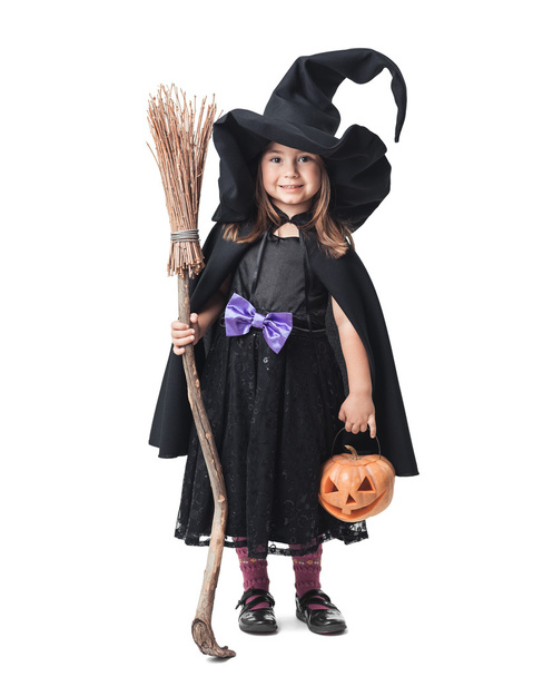 little witch with a broom and pumpkin - Фото, зображення