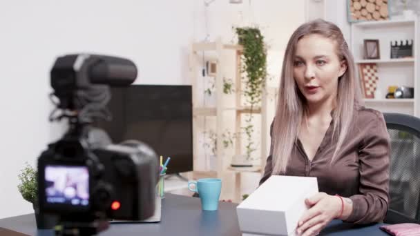 Social media star recording the unboxing of a new phone - Footage, Video