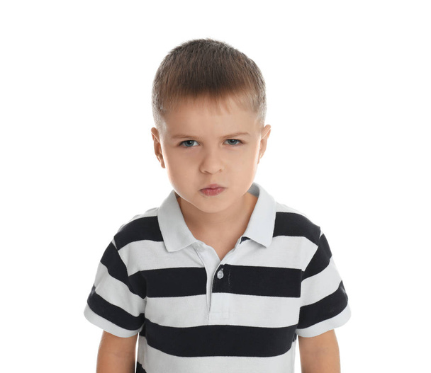 Portrait of angry little boy on white background - Fotó, kép