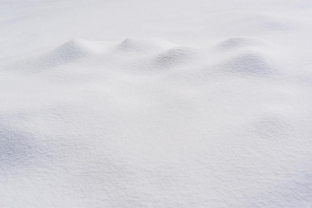 textured surface covered with clear white snow - Foto, Imagen