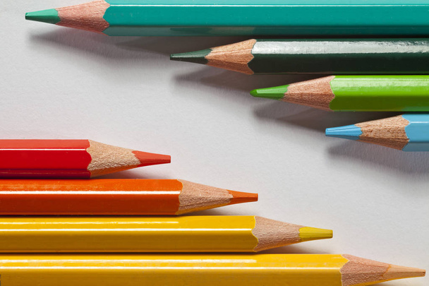 yellow, red, green and blue crayons on white background - Photo, Image