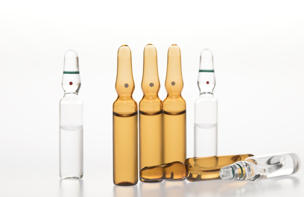 Glass medicine ampoules on a white background - Photo, Image