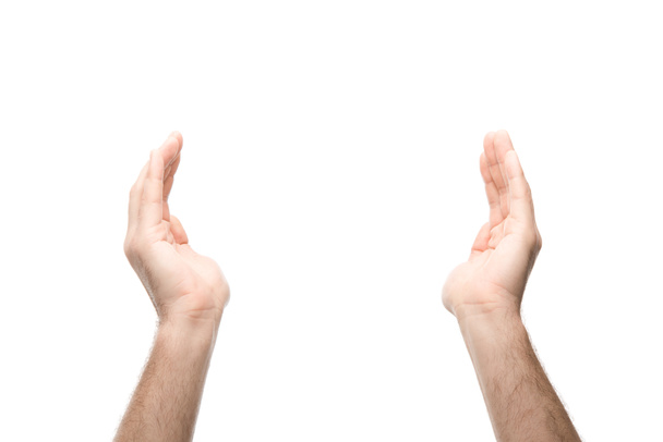 bijgesneden beeld van de mens met uitgestrekte handen geïsoleerd op wit - Foto, afbeelding