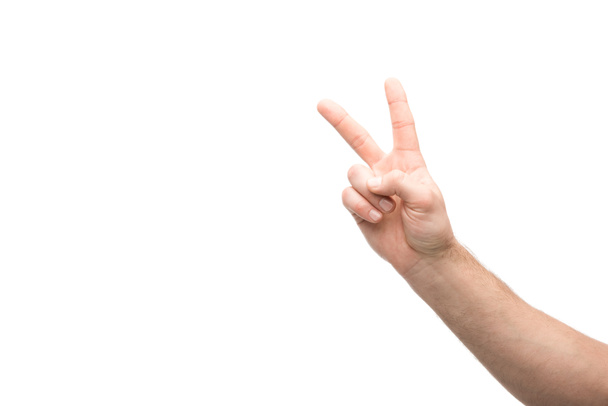 обрезанный вид человека, показывающего знак мира изолирован на белом
 - Фото, изображение