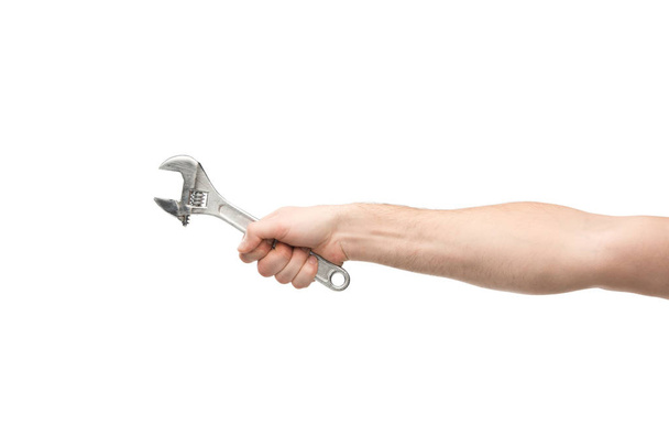 cropped view of man holding spanner isolated on white - Foto, afbeelding