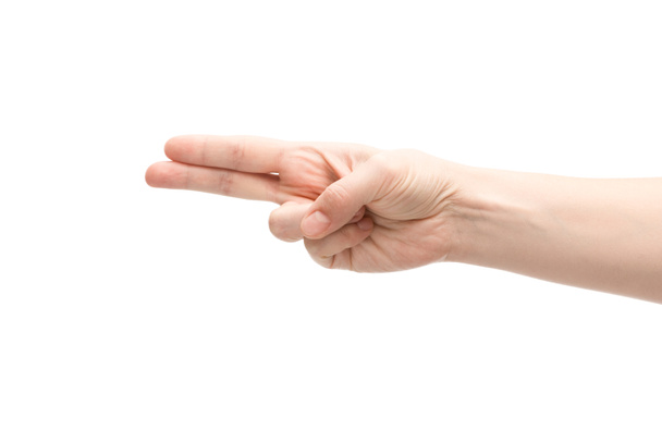 καλλιεργημένη άποψη της γυναίκας που δείχνει δύο δάχτυλα που απομονώνονται σε λευκό - Φωτογραφία, εικόνα