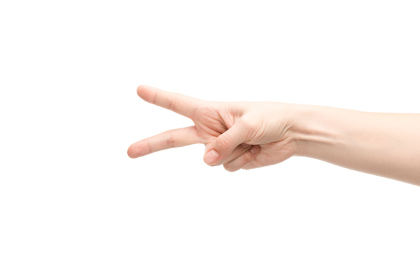 cropped view of woman showing peace gesture isolated on white - Photo, Image