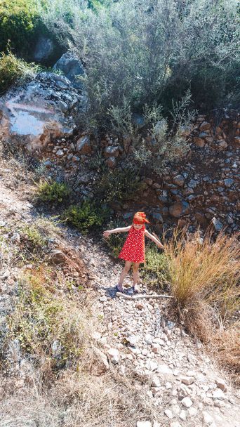 young girl standing in a canyon in a forest  - Foto, Imagem