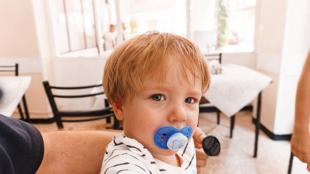 cute baby boy with a toy on the table - Foto, immagini