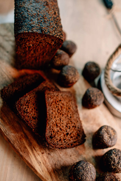 Craft Bread on wood dest  - Фото, изображение