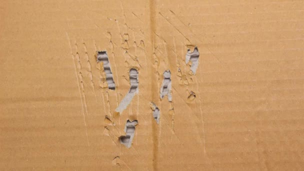 Stop motion animé de feuille de carton ondulé brun déchiré fond abstrait, texture de la boîte en papier recyclé pour le travail d'art de conception
. - Séquence, vidéo