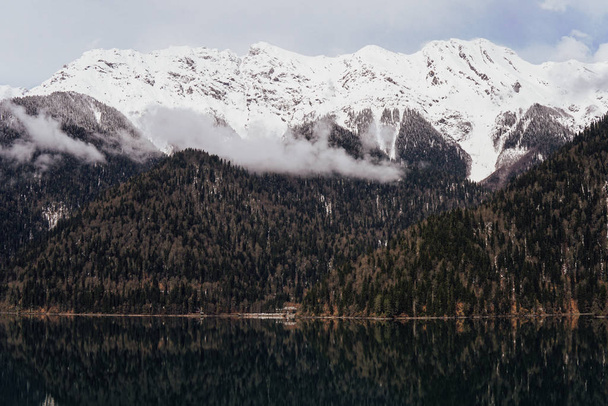 landscape sky snow mountains and mountain Lake - Фото, изображение