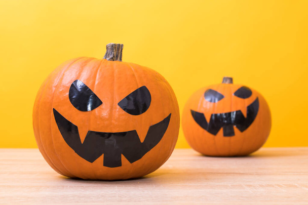 halloween pumpkins in color background - Фото, изображение