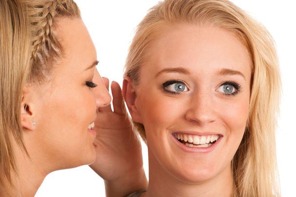 girls chat - woman whispers on friends ear - Φωτογραφία, εικόνα