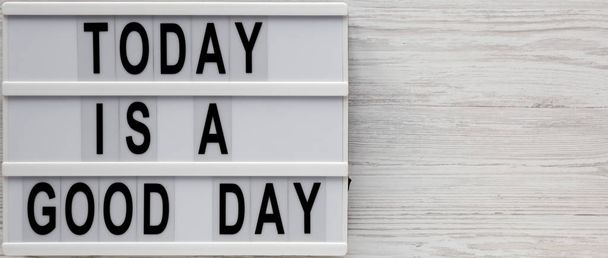 'Today is a good day' words on a modern board on a white wooden  - Photo, Image