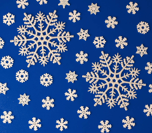 Christmas  festive blue background, with a beautiful pattern of  - Foto, Imagen