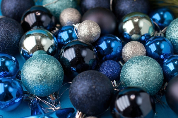  Christmas  festive blue background, on which lies a lot of diff - Zdjęcie, obraz