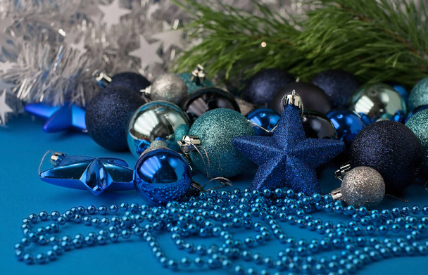  Christmas  festive blue background, on which lies a lot of diff - Fotó, kép
