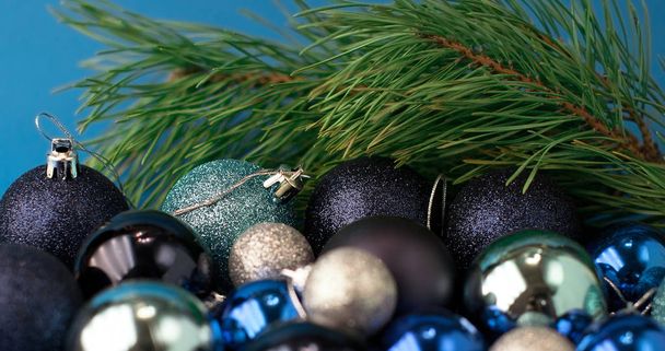  Christmas  festive blue background, on which lies a lot of diff - Zdjęcie, obraz