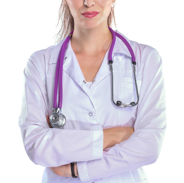 Portrait of young woman doctor with white coat standing in hospital . Portrait of young woman doctor - Foto, Imagen