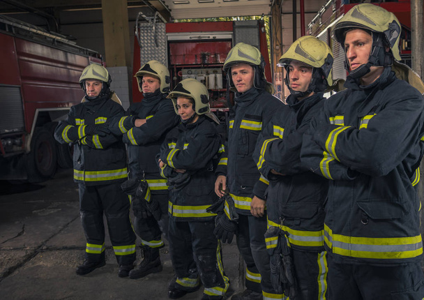 Group of firefighters standing confident with arms crossed. Fire - Photo, Image
