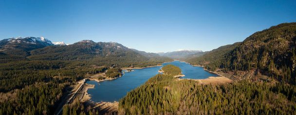 Aerial Panoramic View of Daisy Lake during a sunny day in Fall Season. Located near Squamish and Whistler, North of Vancouver, British Columbia, Canada. - Fotó, kép