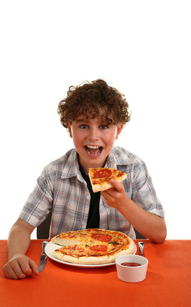 Boy eating pizza - Foto, Bild