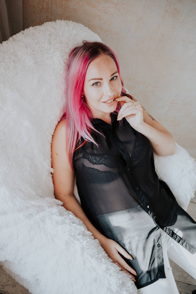 Portrait of beautiful fashionable woman with pink hair - 写真・画像