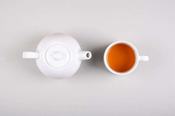 Tea cup composition on gray background. Flat lay. - Foto, afbeelding
