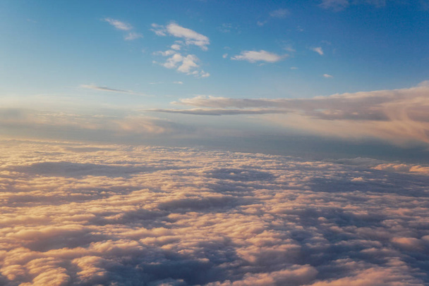 clouds at sunset from iljuminatora plane sky Sun travel - Photo, Image