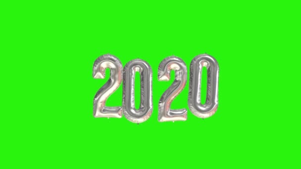 2020年のお祝い。緑の背景に銀箔風船数2020 - 映像、動画