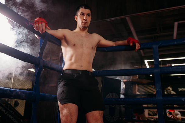 serious muscular man after active fight - Fotografie, Obrázek