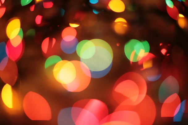 新年のガーランド・ボケ異なるライトの色 - 写真・画像