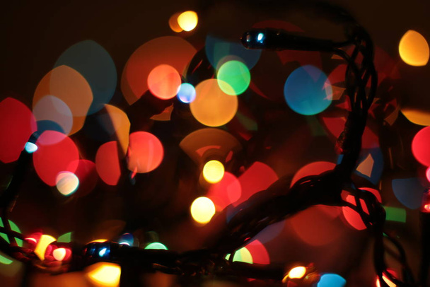 多色のガーランドボケクリスマスの背景 - 写真・画像