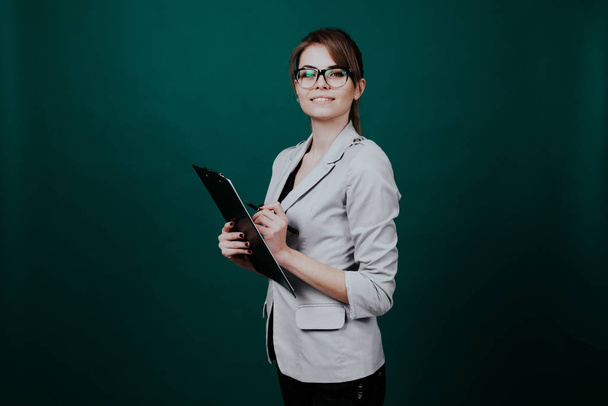 business woman Secretary stands with folder securities teacher - Zdjęcie, obraz